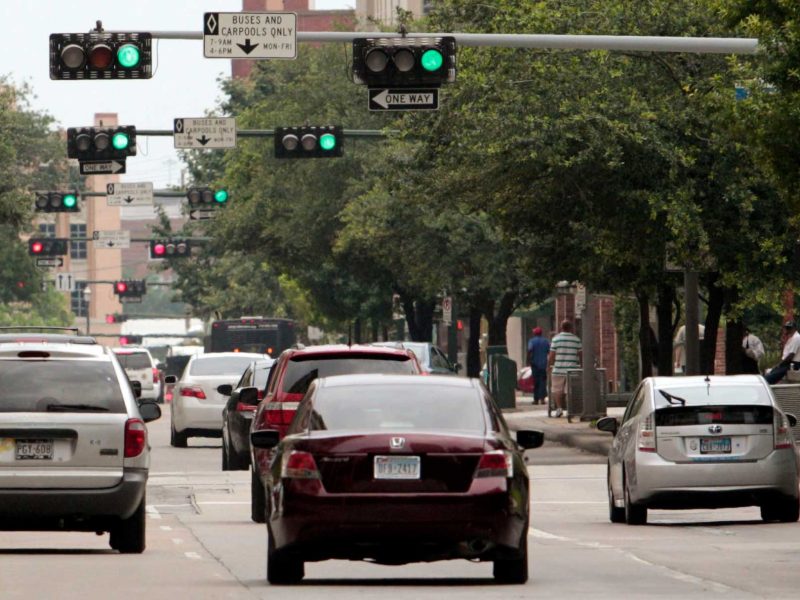 Multiple lights along San Jacinto, northward are in synchronization as traffic flows in downtown, Houston, Texas. (Billy Smith II / Chronicle)